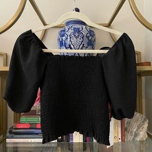 Shirred black crop top with puff sleeves